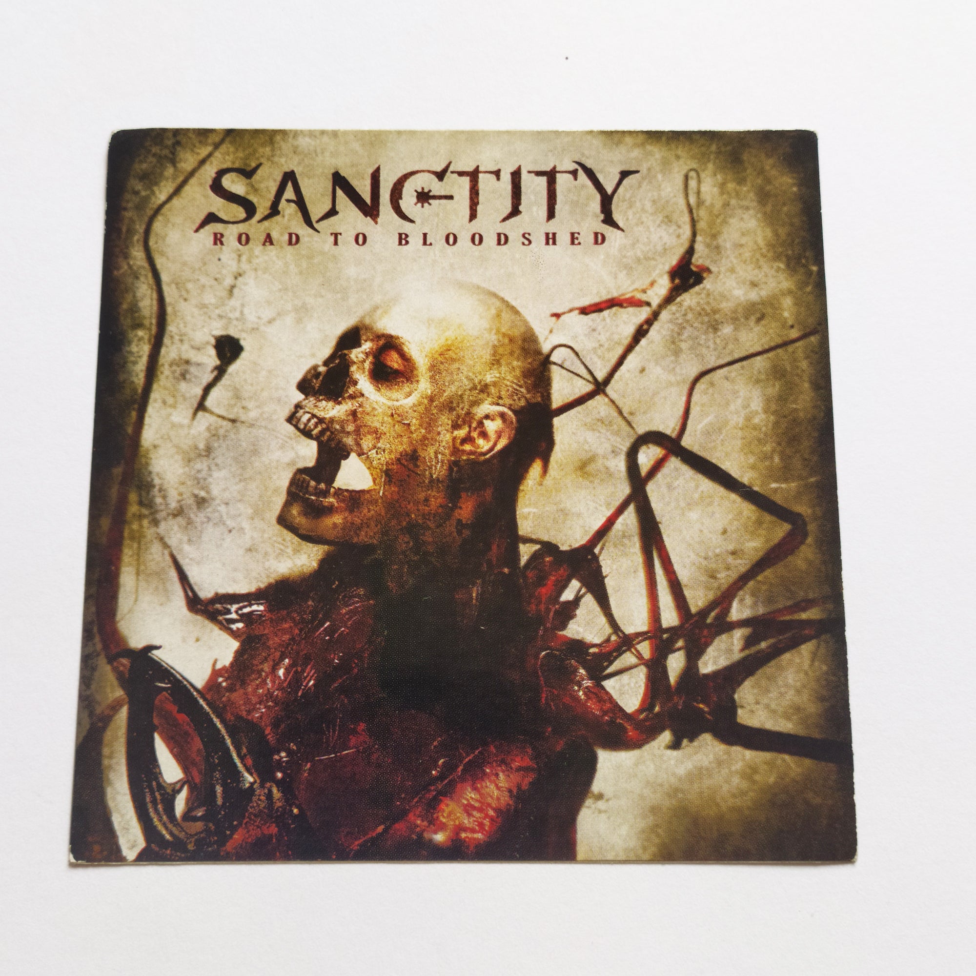 Sanctity - Road To Bloodshed Music Sticker - SkateboardStickers.com