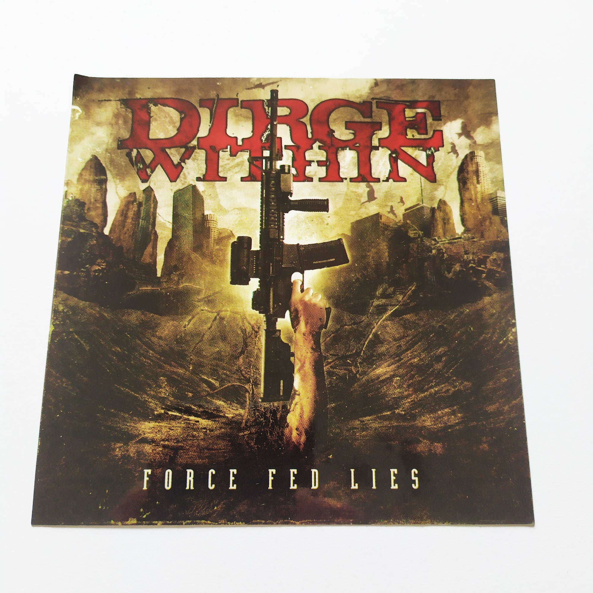 Dirge Within - Force Fed Lies Music Sticker - SkateboardStickers.com