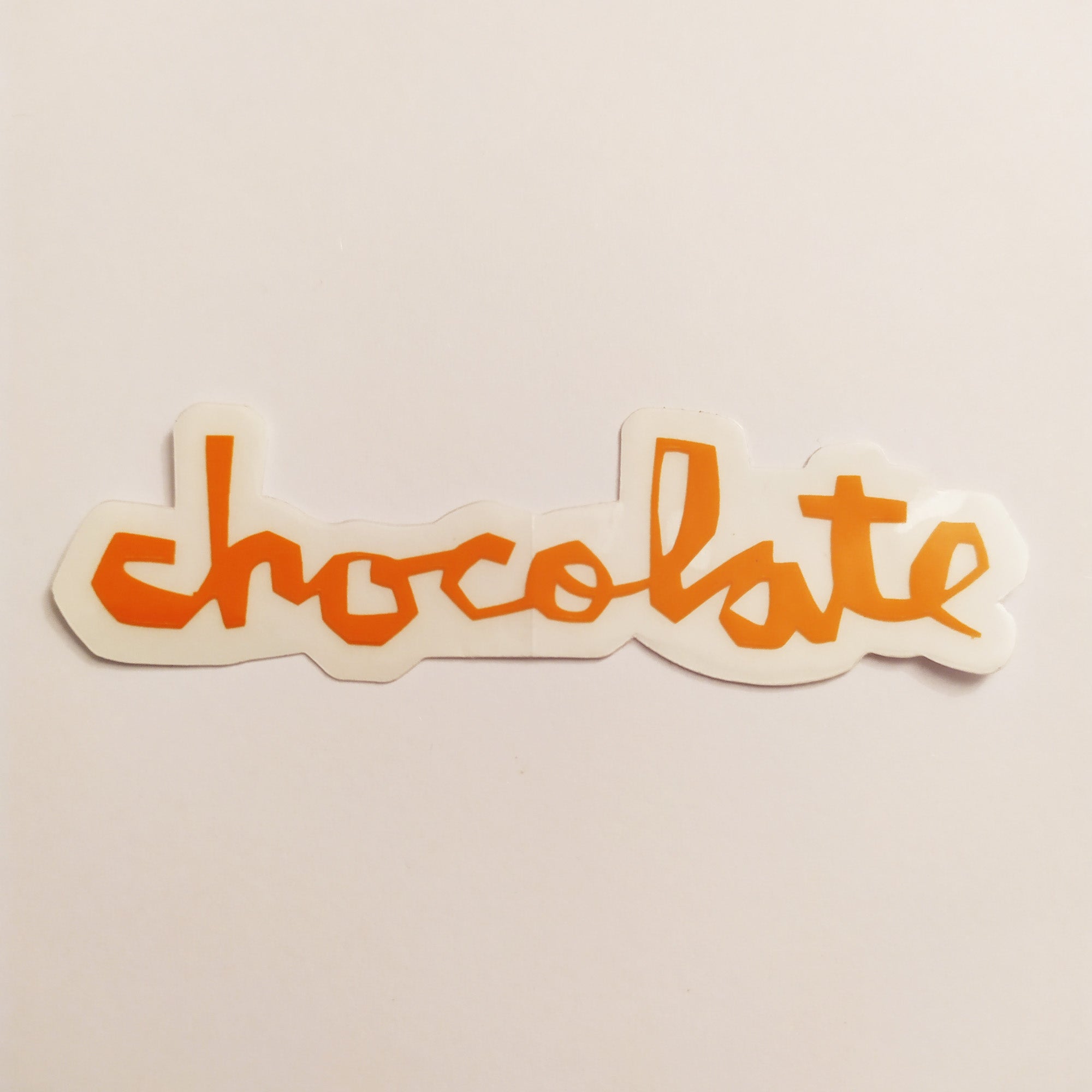 Chocolate Chunk Logo Skateboard Sticker - Orange - 8cm across approx