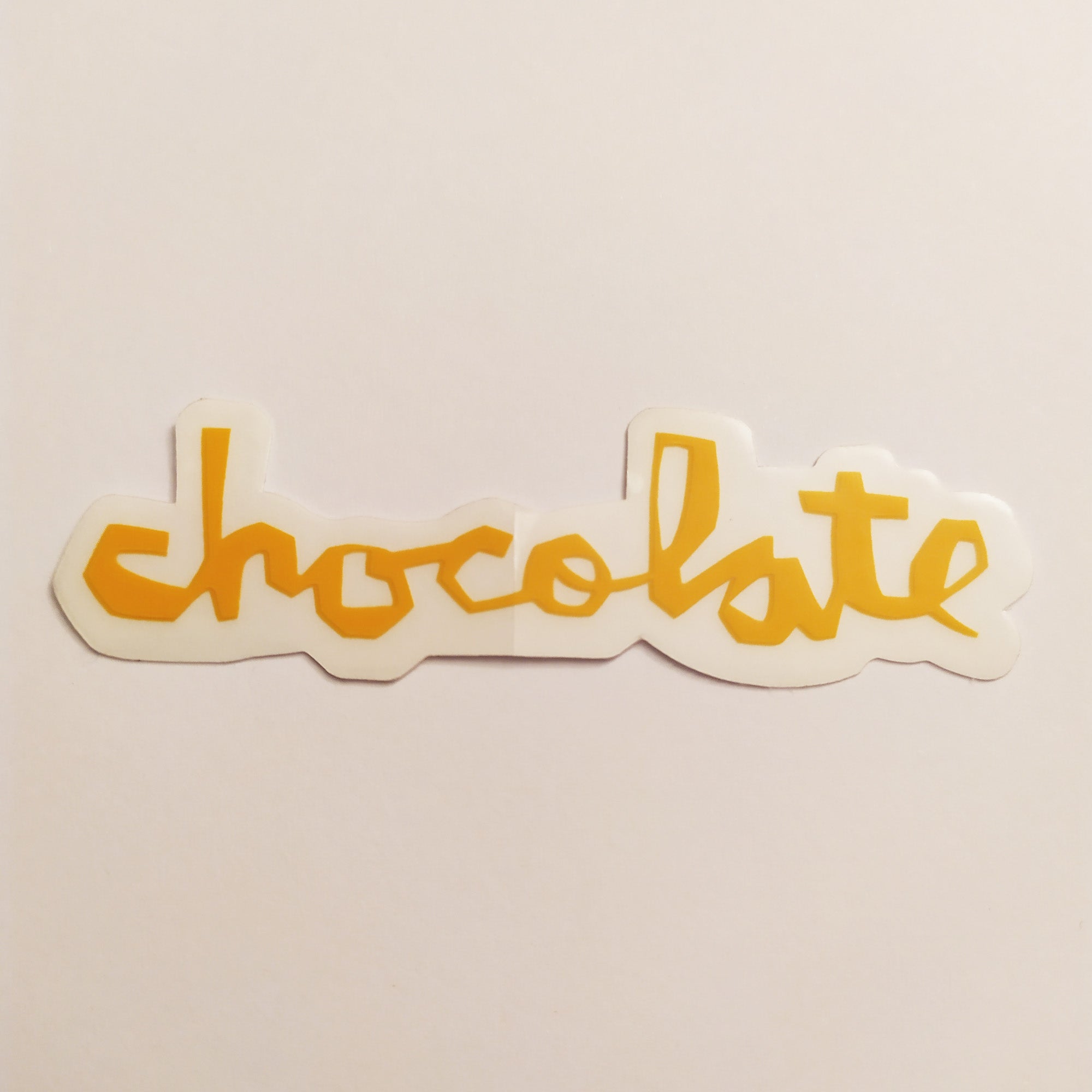 Chocolate Chunk Logo Skateboard Sticker - Light Orange - 8cm across approx