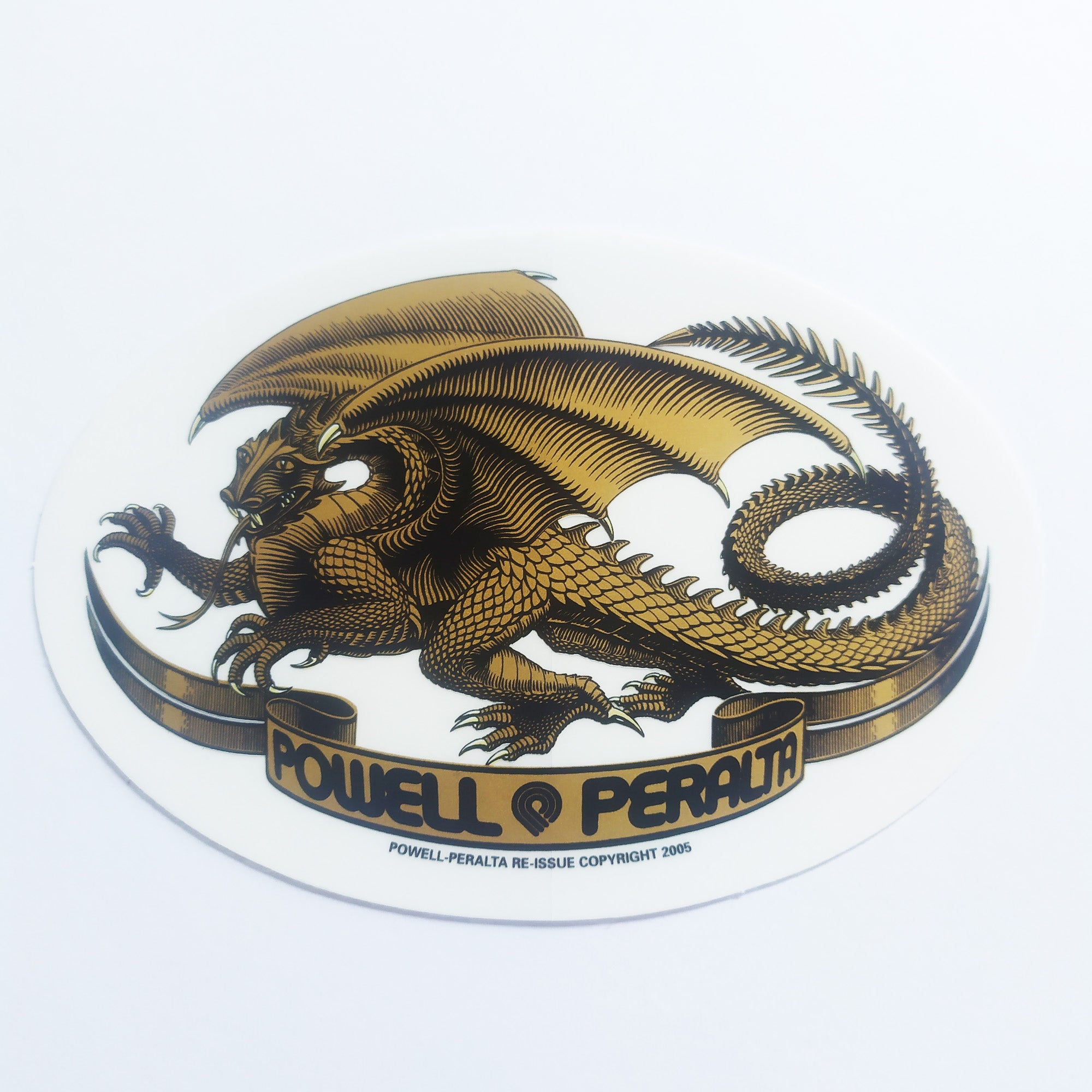 Powell Peralta, "Oval Dragon" Skateboard Sticker in Gold. 13cm x 9cm approx