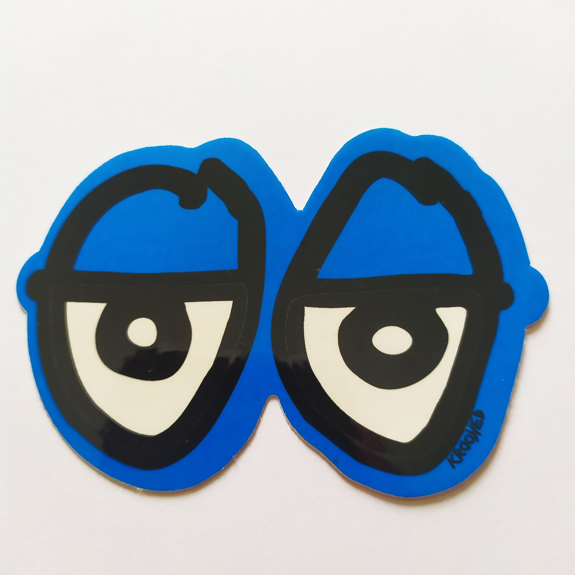 Krooked "Eyes" Skateboard Sticker - Blue, 15cm - SkateboardStickers.com