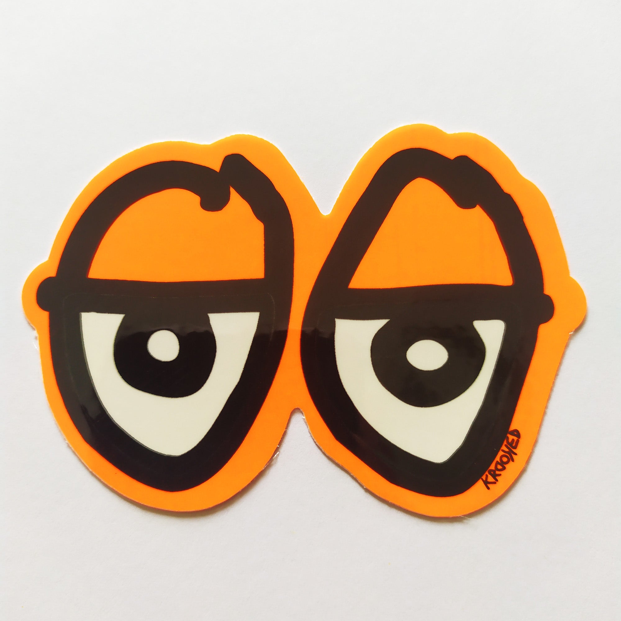 Krooked "Eyes" Skateboard Sticker - Orange, 15cm - SkateboardStickers.com