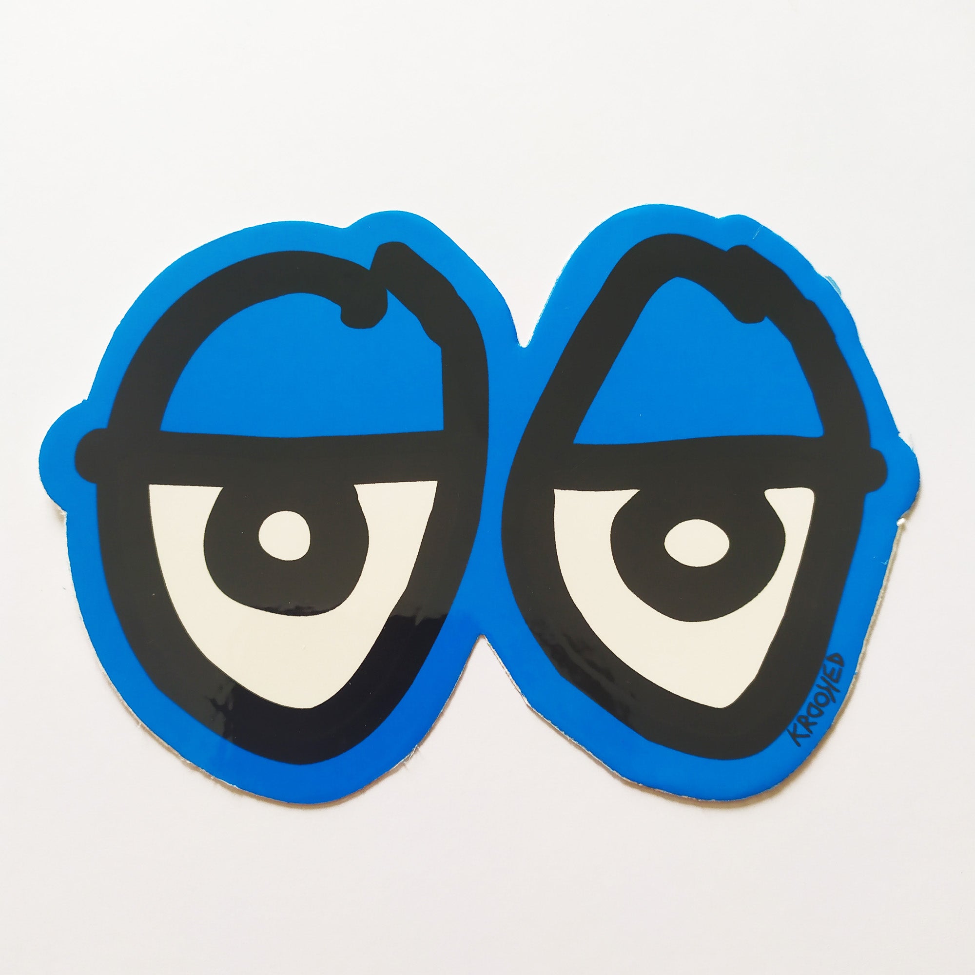 Krooked "Eyes" Skateboard Sticker - Blue, 8.5cm - SkateboardStickers.com