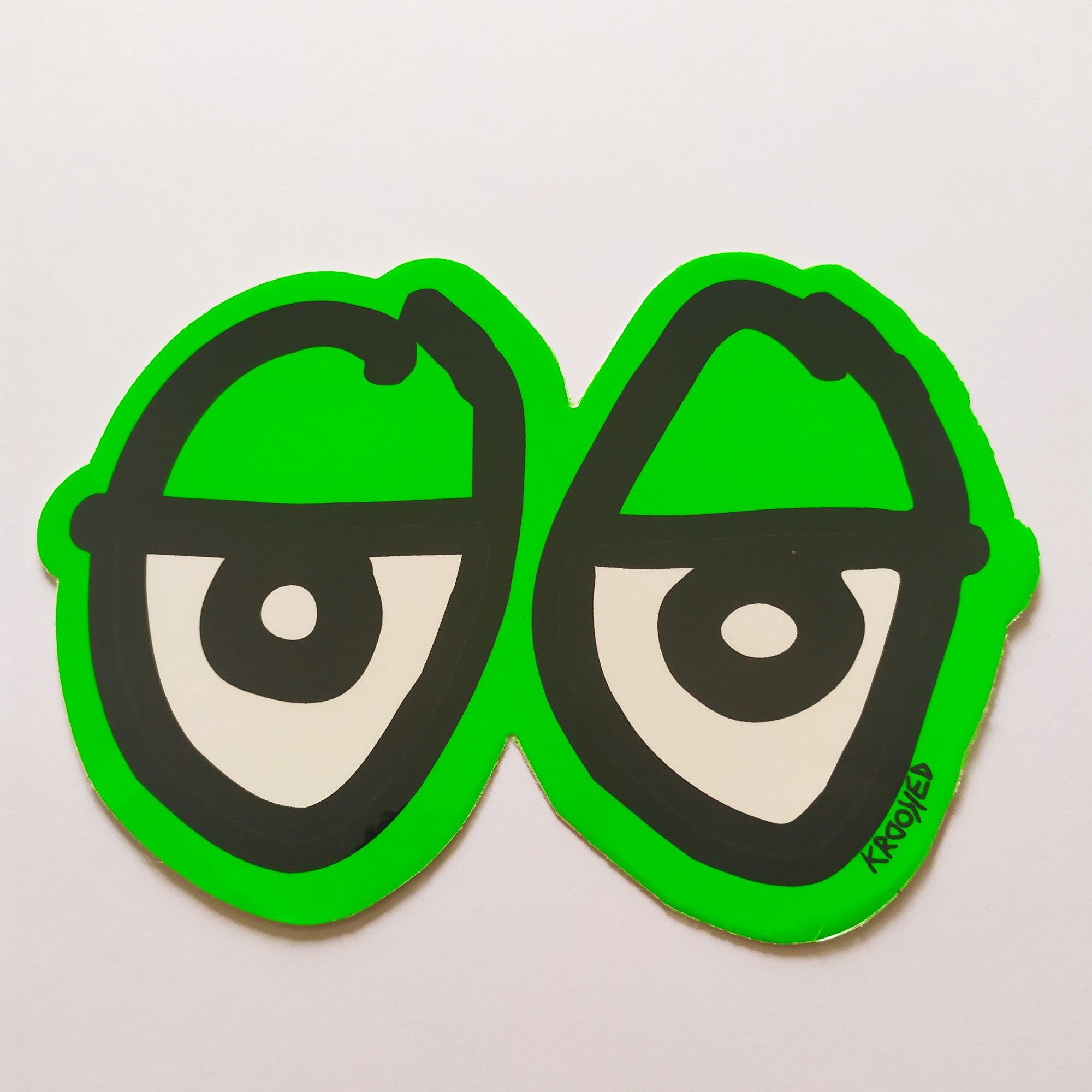 Krooked "Eyes" Skateboard Sticker - Green, 8.5cm - SkateboardStickers.com